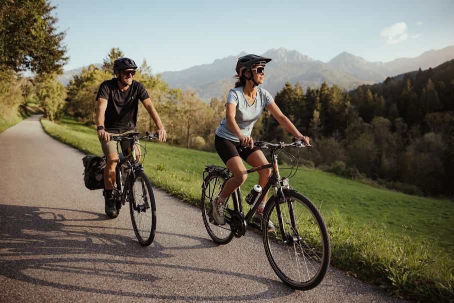 A man and a woman on a bike tour